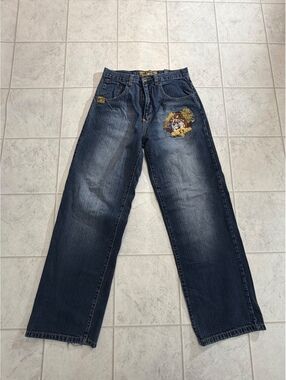 Uh North Denim Jeans with Embroidered Lion Patch
